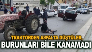 Traktörden düştüler, burunları bile kanamadı