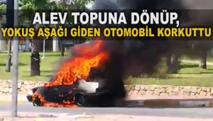 Alev topuna dönüp, yokuş aşağı giden otomobil korkuttu
