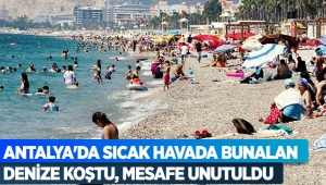 Antalya'da sıcak havada bunalan denize koştu, mesafe unutuldu