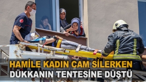 Hamile kadın cam silerken dükkanın tentesine düştü