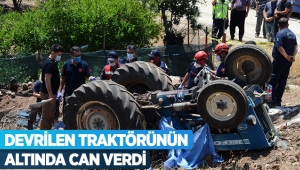 Devrilen traktörünün altında can verdi