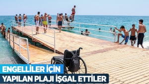 Engelliler için yapılan plajı işgal ettiler
