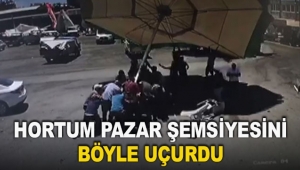 Hortum pazar şemsiyesini böyle uçurdu