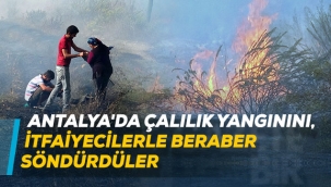 Antalya'da çalılık yangınını, itfaiyecilerle beraber söndürdüler