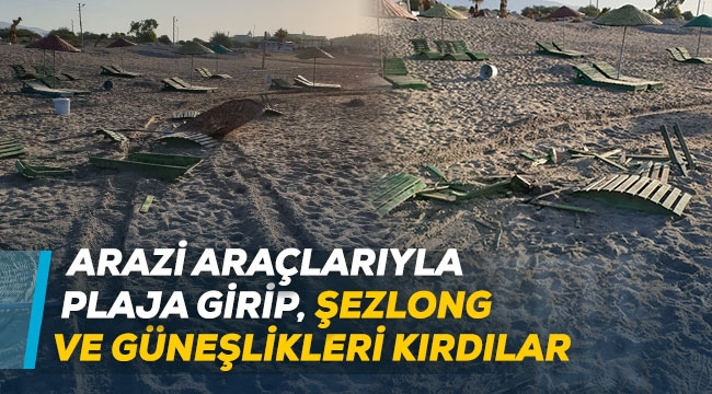 Arazi araçlarıyla plaja girip, şezlong ve güneşlikleri kırdılar