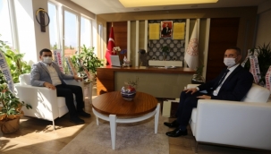 Tütüncü’den Er’e ziyaret