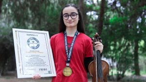 Cansu, kemanıyla 6 ayda elde ettiği 16 dereceyle Guinness'e girdi