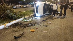 Takla atan araçtan hafif yaralı kurtuldu