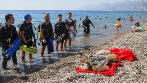 Kıyı ve dip temizliğinde turist altın küpe buldu, dalgıçlar çöp çıkardı