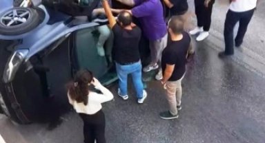 Takla atan otomobilden burnu kanamadan çıktı