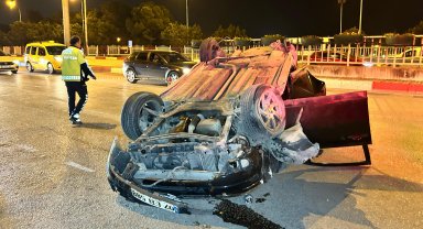 Takla atan otomobilden burunları kanamadan çıktılar