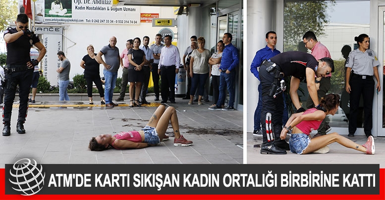 ATM'de kartı sıkışan kadın ortalığı birbirine kattı