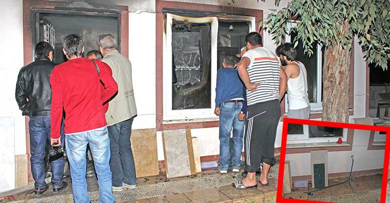 Bir metre hortumla söndürmeye çalıştı
