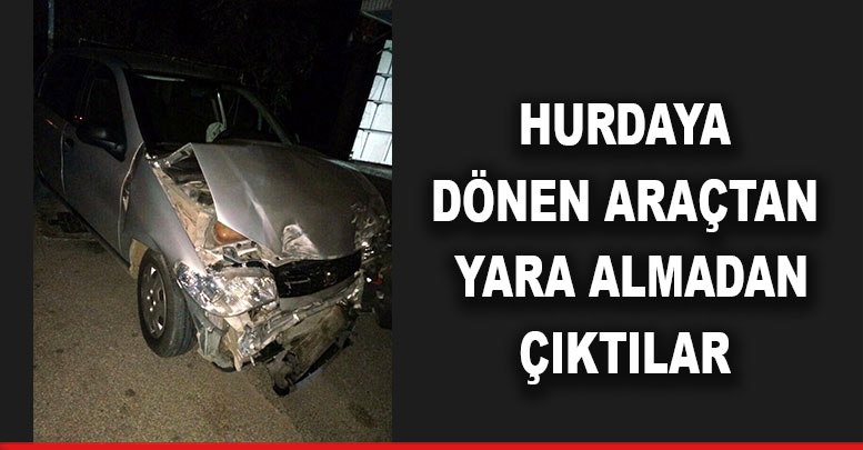 Hurdaya dönen araçtan yara almadan çıktılar