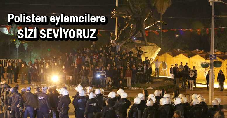 Polisten eylemcilere SİZİ SEVİYORUZ