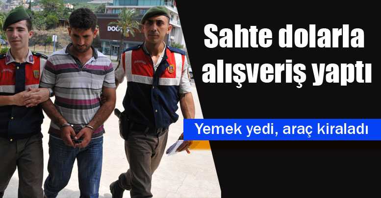 Sahte dolarla alışveriş yaptı
