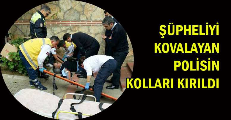 Şüpheliyi kovalayan polisin kolları kırıldı