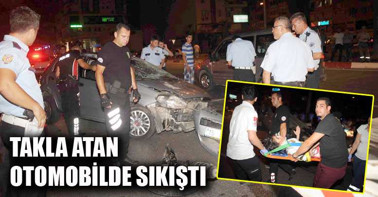 Takla atan otomobilde sıkıştı